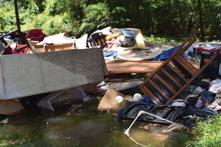 <b>(1)</b> The heavy rainstorms of April 2016 resulted in flooding that caused extensive damage in Houston, Texas, and adjacent counties. (<i>Photos by Jann Tracey, Federal Emergency Management </i><i>Agency.)</i>