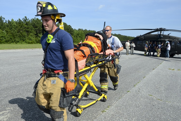 Rescuers remove a victim.