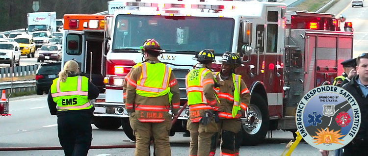 Fire apparatus blocking at the scene of a roadway incident.