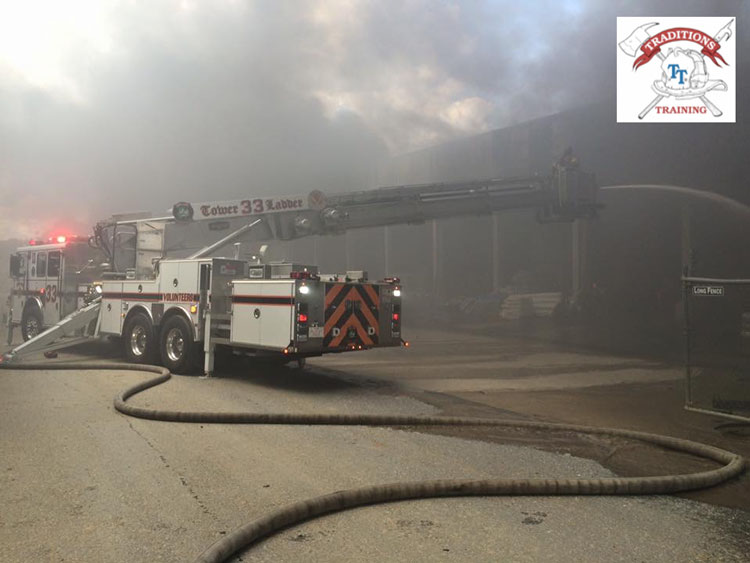 Apparatus pouring water on a fire