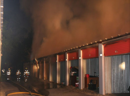 (11) Monitor the wind direction of a toxic plume. Consider whether to evacuate civilians or to shelter in place. At night, the smoke plume’s movement may be more stationary. [Photo courtesy of Escambia County (FL) Fire and Rescue.]