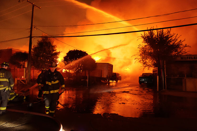 Chicago firefighters at the scene of a 5-11 alarm fire.