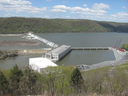 (4) A view of a hydroelectric plant and dam. 