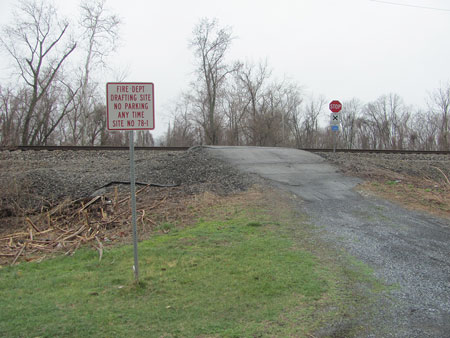 (8) A draft site sign near the river drafting point. 