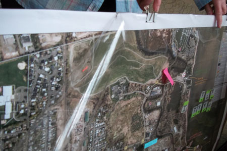 (2) Cover the map with clear acetate. Back it with cardboard or foam board, and attach it with clips. Colored sticky tabs can be used to represent fire and police units and can be moved around as your plan develops. (3) A separate overlay of acetate can indicate evacuation zones and provide critical distances based on the scale of your map.