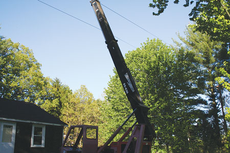 (2) The view opposite the angle of approach. Although it appears that the boom is running between the two wires, the bottom wire runs over and is in contact with the boom, although it seems to run behind it. 