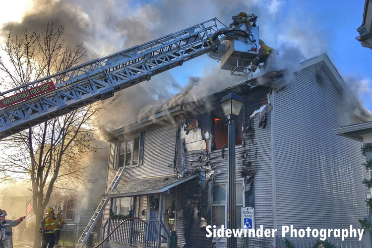 Tower Ladder in operation at a fire in a multi-dwelling in Waterford, New York.