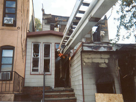 (2) This building received a hydraulic overhaul before a “bulldozer facial.” Although the boom was in the collapse zone, the entire rear of the building was already gone, so the collapse danger is minimal. Still, personnel were kept out and no casualties occurred.