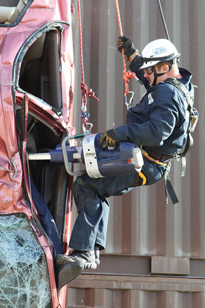 (2) A member uses a tool while the tool and the member are tied off from above. This might give the member an indication of how the tool is going to react. 