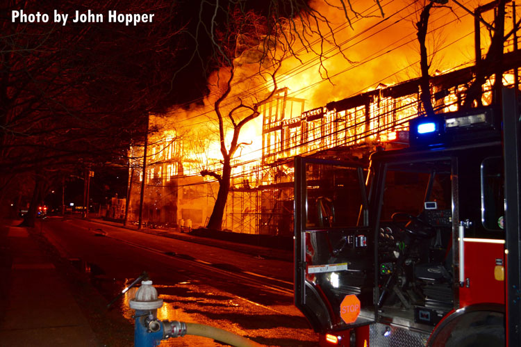 Fire engulfs a lightweight construction building in Maplewood, New Jersey.