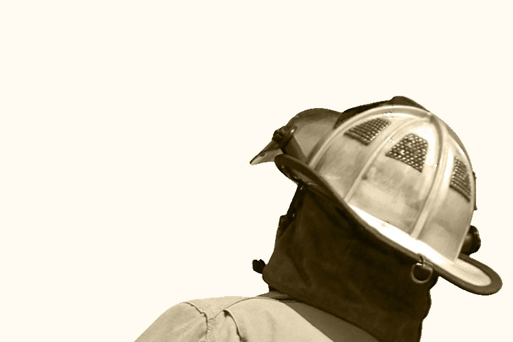 Firefighter wearing a helmet