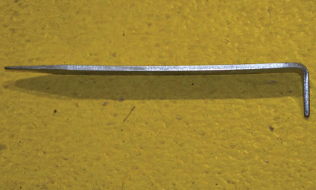 (1) A standard key tool has two ends, the 90° bend cam end and the flat end.<i> (Photos by author.)</i>