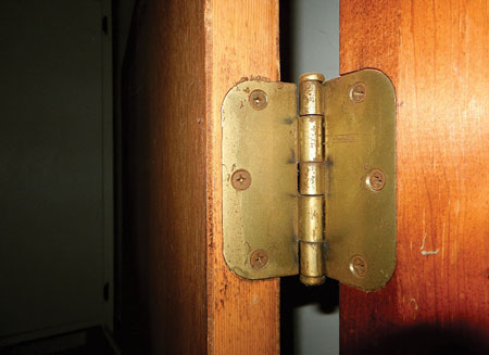 (1) A typical hinge installation for six screw hinges: 1⁄2-inch screws, three per leaf, secure the hinge to the door and the frame. Heavy exterior doors use three hinges with eight screws, four per leaf. (Photos by author.) 