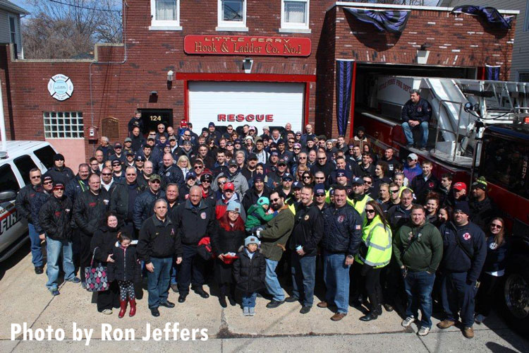 Firefighters and other first responders deal meet with a young Little Ferry citizen who is suffering from cancer.