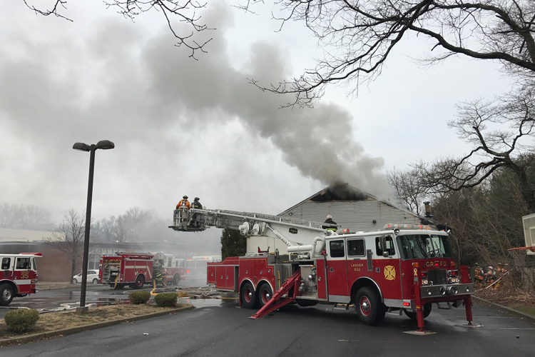 Fire apparatus at a fire in a church building in Glen Rock, New Jersey.