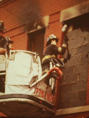 (6) Attacking the top course of blocks and working downward when operating in the tower ladder bucket reduce the chances of the entire blocked section’s falling outward and downward toward members operating below.