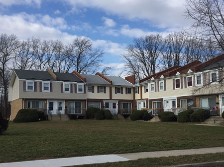 (1) This 1970s-era townhouse complex features masonry fire walls with parapets between each unit. <i>(Photos by author unless otherwise noted.) </i>