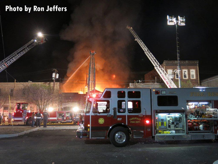 Fire apparatus at the scene of a structure fire in Passaic, New Jersey