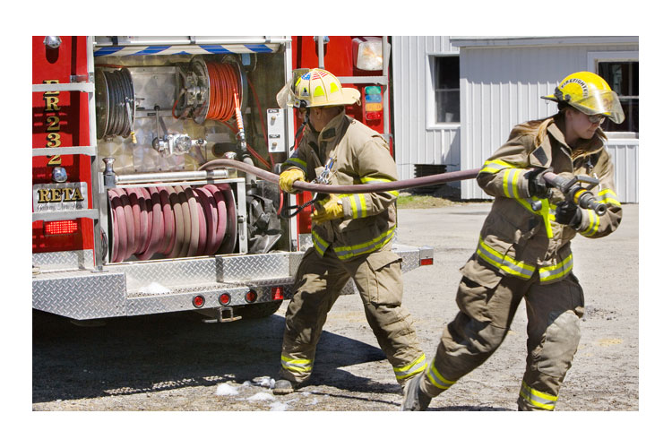 Firefighters using Hannay Reels 