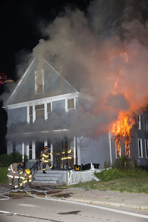 (<b>4-5) </b>The outward-swinging burglar gates that fortify the inward-swinging front doors of this house are usually fortified with tubular dead bolts.