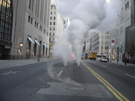 (1) Park upwind, out of the steam plume, at least one block away, and out of the potential asbestos hazard released by the damaged steam main. (Photos by Anthony Natale, courtesy of the Emergency Response Team, Consolidated Edison of New York.)