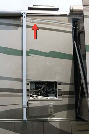 (7) An ammonia refrigerator system showing outside heat damage below the vent (arrow).