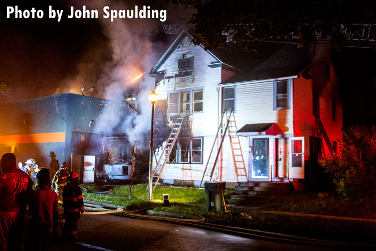 Firefighters at the scene of a recent house fire