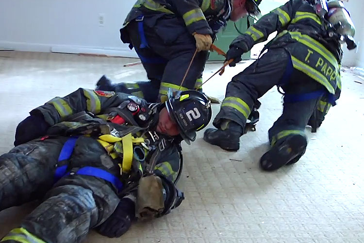 Removing a down firefighter