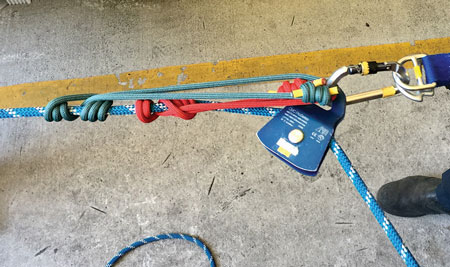 (17) A tandem prusik belay is used for the rescuer and victim.