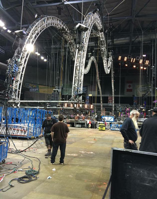 <b>(1-2)</b> Motley Crue’s staging being loaded in at the Huntington Center, Toledo, Ohio. The truss work is the drum roller coaster that Tommy Lee rides during shows. (Photos 1-3 by Troy Roeske; photo 4 by author.)