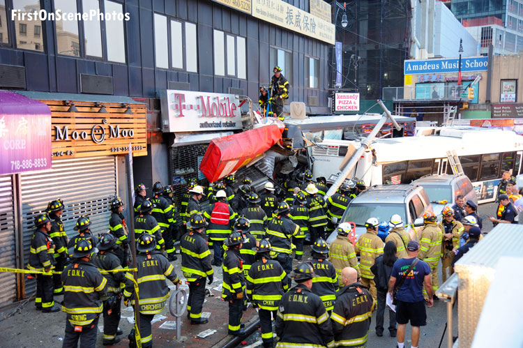 FDNY members working at the scene of a bus accident