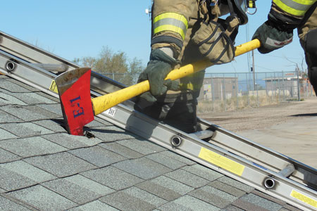 (1) Using a pickhead ax, make a hole in a roof. (Photos by author.)