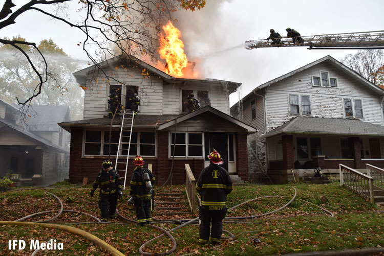 Indy firefighters battle fire in a double residence