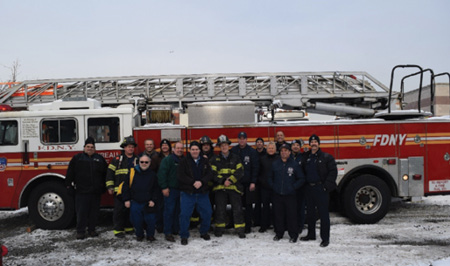 (3) FDNY, Con Edison, Seattle Fire Department, and Seattle City Light personnel after a drill at “The Rock” FDNY Training Academy in 2017. 