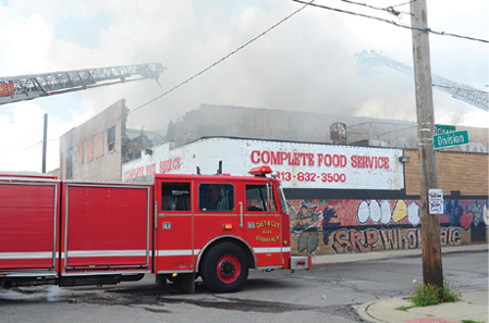 (6) The fire was contained to the original fire building (which collapsed) and did not extend into either exposure. Apparatus was positioned outside the potential collapse zone.