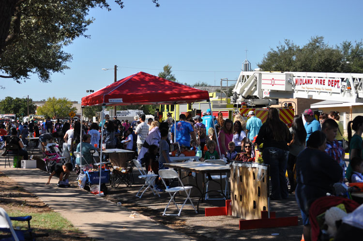 Residents throng the Midland Fire Department Truck or Treat event