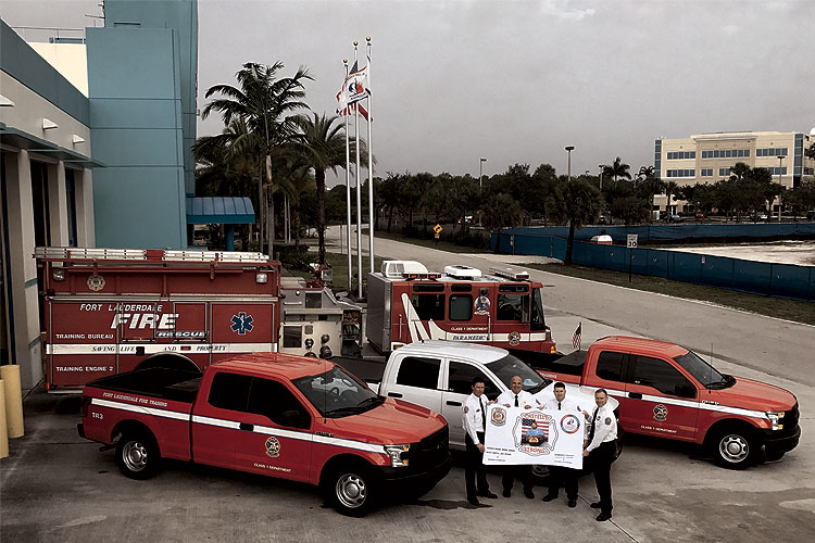 Fort Lauderdale Fire Rescue vehicles and officers