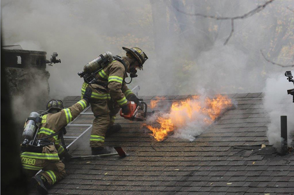 (5) Crews cut a hole directly over the fire, close to the ridge. (Photo courtesy of Frank Ricci.)