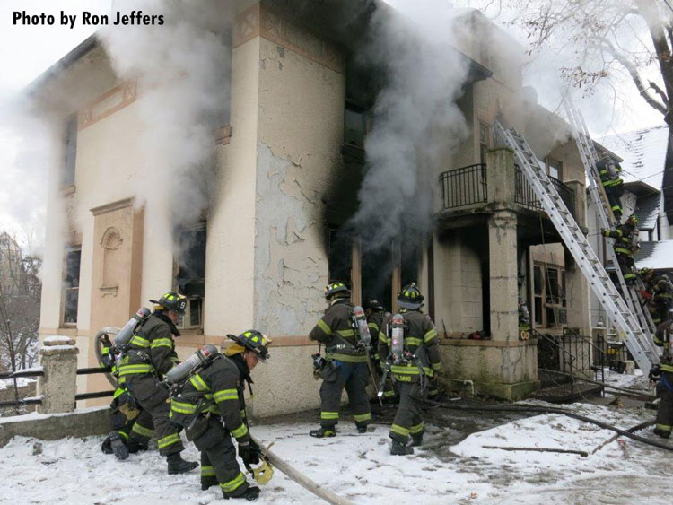 Firefighters working at the scene of a Weehawken fire