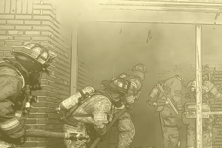 Firefighters advance a line into a dwelling during fire training