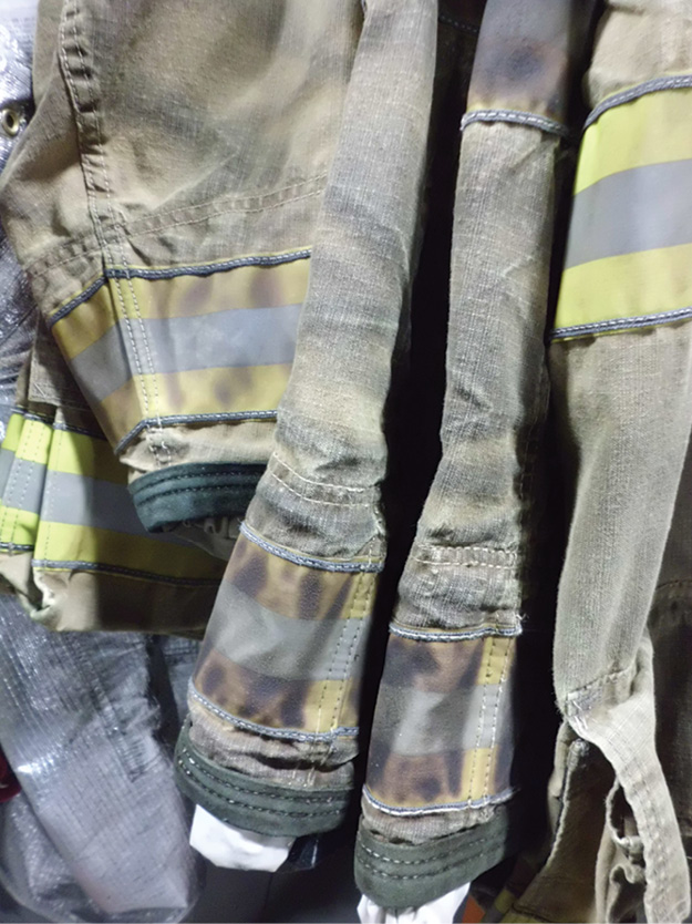 (2) Firefighter clothing becomes easily contaminated and retains that contamination if not properly washed; if soiling is visible, it is likely that the gear is still contaminated. (Photo courtesy of Gear Cleaning Solutions.)