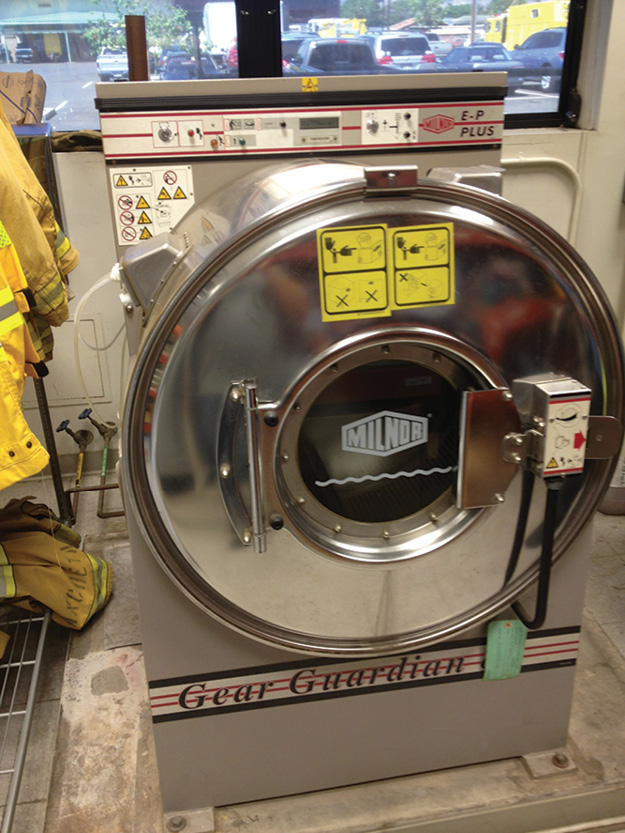 (3) The selection of the appropriate washer/extractor, detergent, and wash cycle are all important for the effective cleaning of turnout clothing. (Photo courtesy of Gear Cleaning Solutions.)