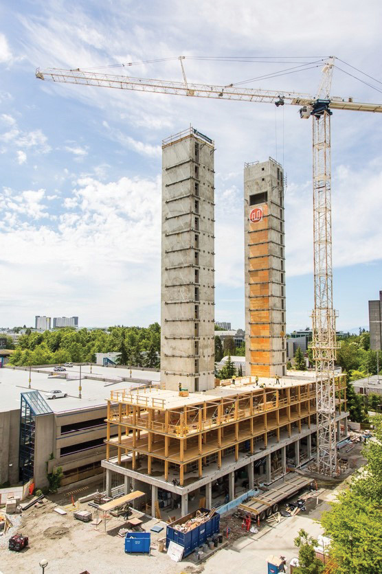 (2) The concrete cores rise above the floors of the Brock Commons Tallwood House, constructed in 2016. 