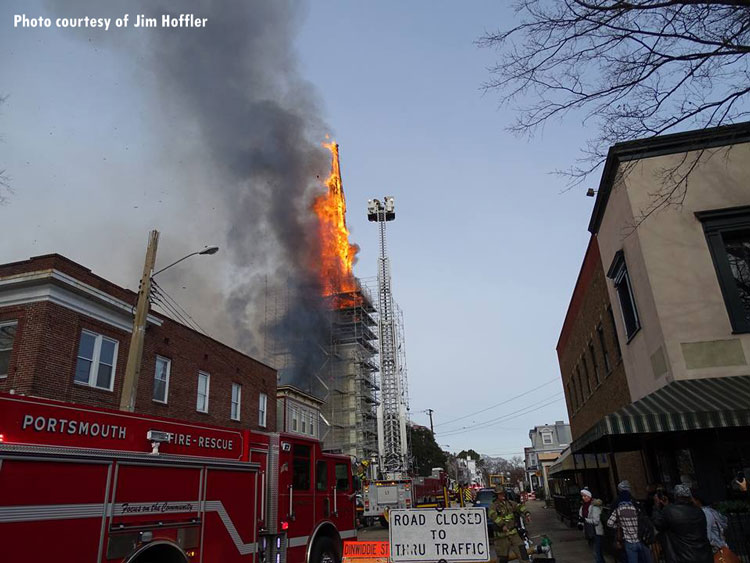 Church steeple on fire