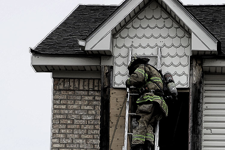 A firefighter on a ladder