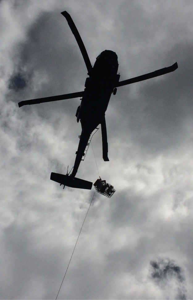 (5) VA-TF2 and the Kentucky Air National Guard perform a basket hoist in Coral Bay, St. John.