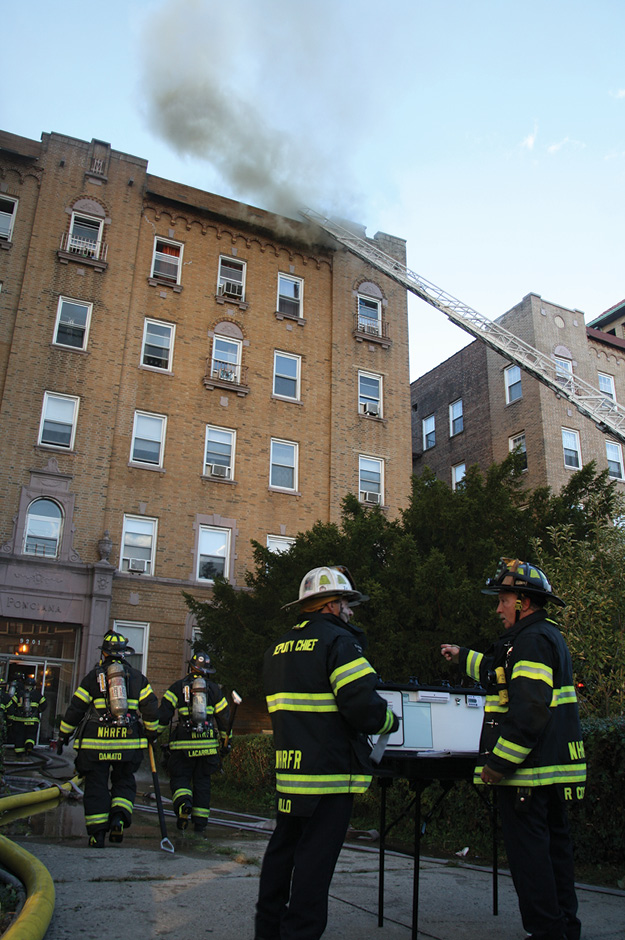 (2) How can we possibly use a two-person stretch to get water on these two fires? They must be “all-hands” stretches in which as many personnel as are available are enlisted to get the first line in service and operating on the fire. (Photos by Ron Jeffers.)