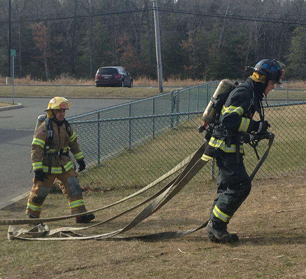 (3) When the line being dragged is longer than the firefighter is tall, it will snag on everything in its way. This is an extremely inefficient way to stretch a line.