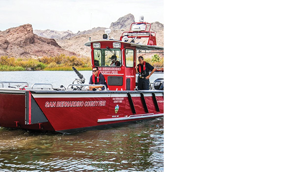 Lake Assault Boats has placed this 28-FOOT FIRE AND RESCUE BOAT into service with the San Bernardino County (CA) Fire District (SBCFD). The craft is stationed in Needles, California, and serves on the Colorado River. The boat serves multiple purposes along a vitally important stretch of the river, where the SBCFD can fight fire or support ground-based operations directly. It has comprehensive dive and rescue capabilities and is designed to serve as a wildland team personnel carrier and ATV transport, addressing just about any emergency scenario the department encounters along the river. www.lakeassault.com. (715) 395-2255. To request information go to fireeng.hotims.com