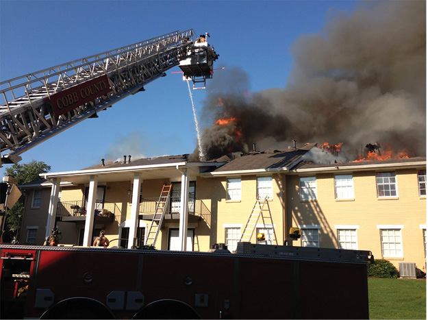 (10) Streams onto the roof do not reach the seat of the fire.